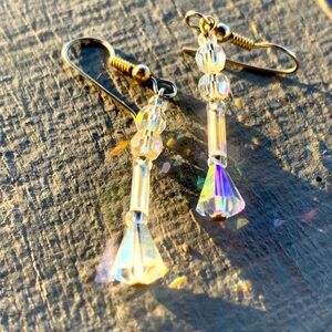 Elegant iridescent cut crystal dangling earrings.